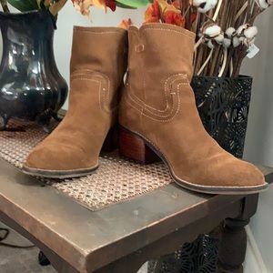 Brown suede Dolce Vita boots.